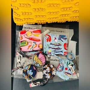 Vera Bradley mini wallets, AirPods case, measuring tapes